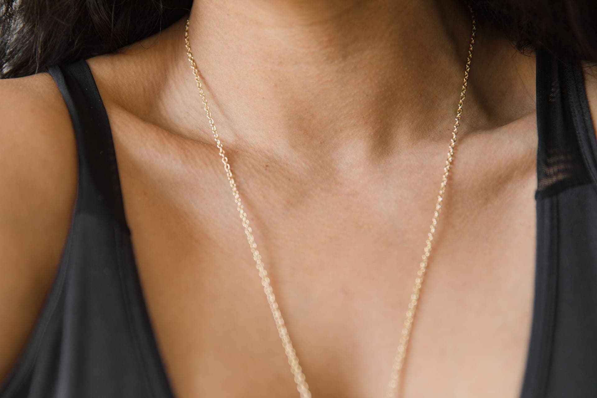Close-up of gold-toned chain links showing the link structure